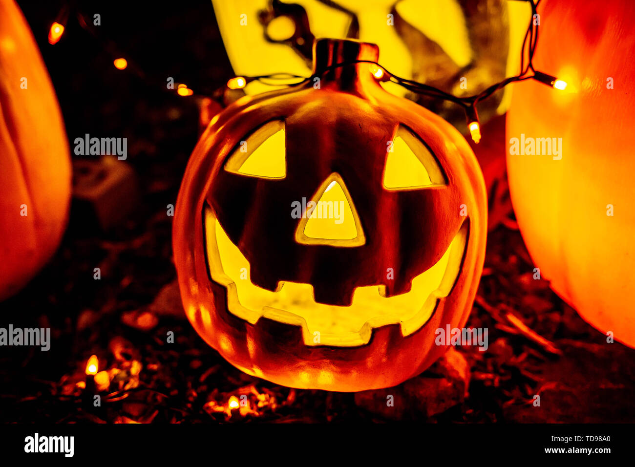 Scary Halloween decorations outdoors at night lighted Stock Photo Alamy