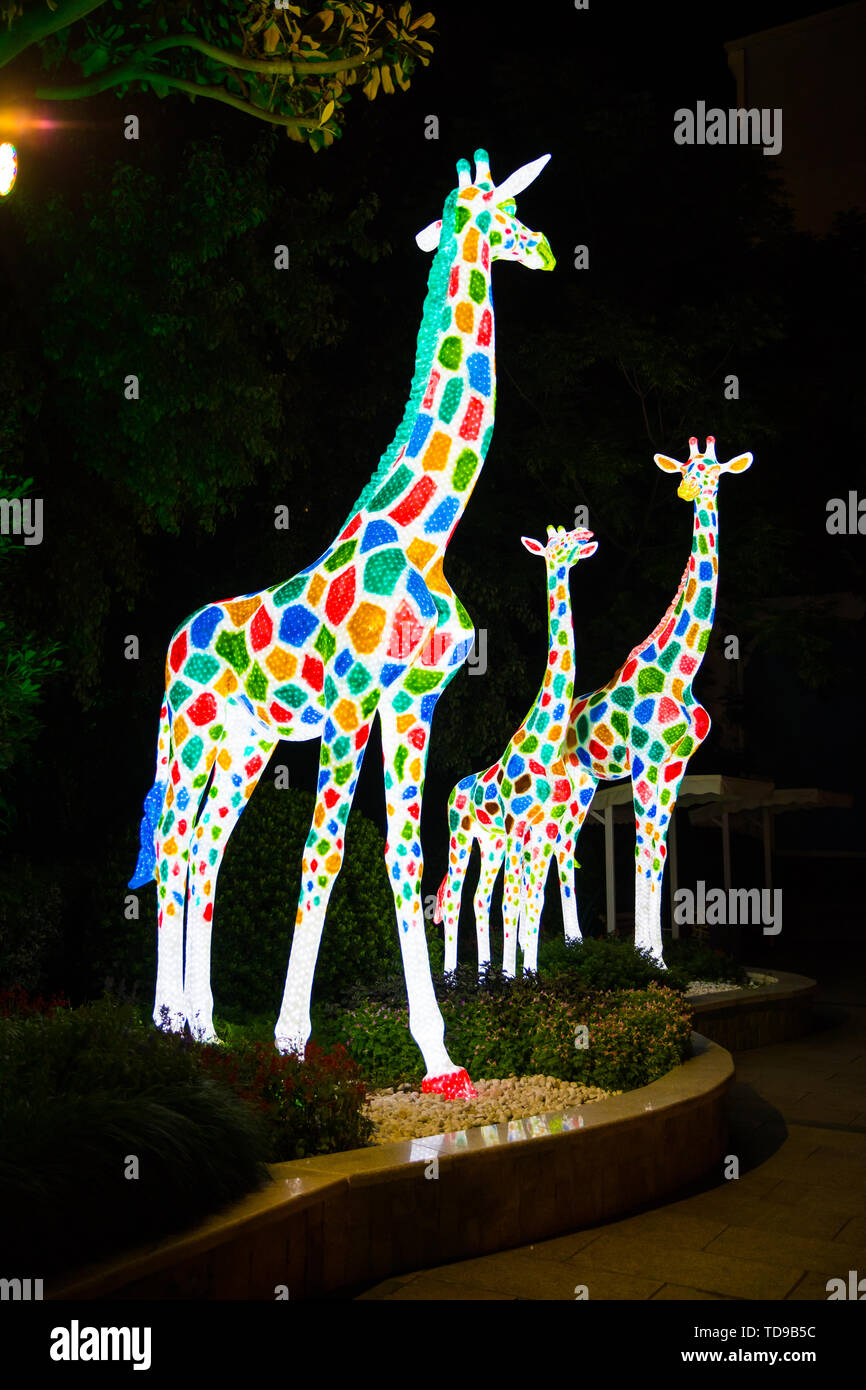 Colorful giraffe statue, colored lamp shape Stock Photo Alamy