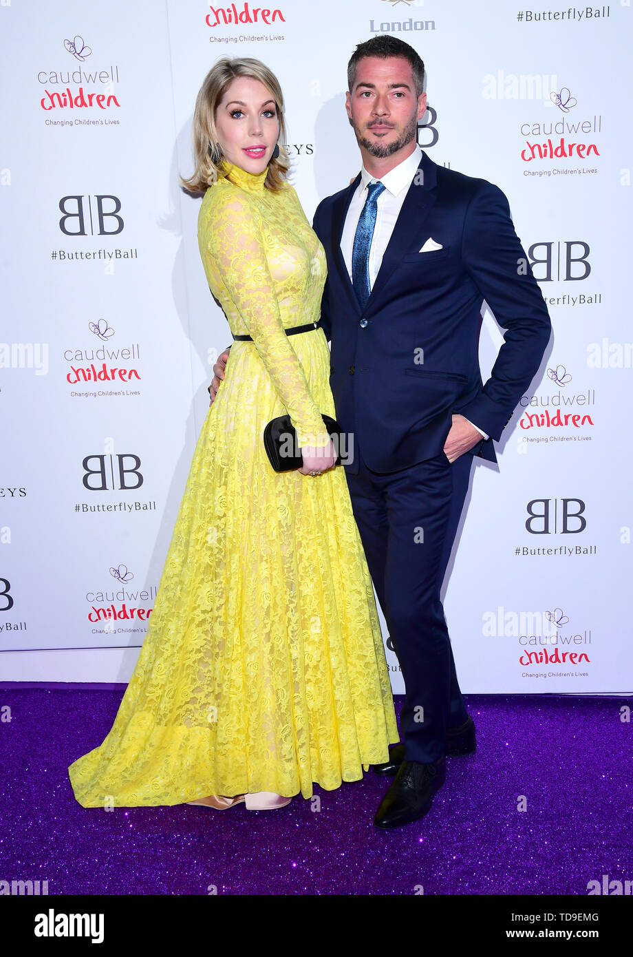 Katherine Ryan and Bobby Kootstra attending the Butterfly Ball Charity fundraiser held at the Grosvenor House Hotel London. Stock Photo