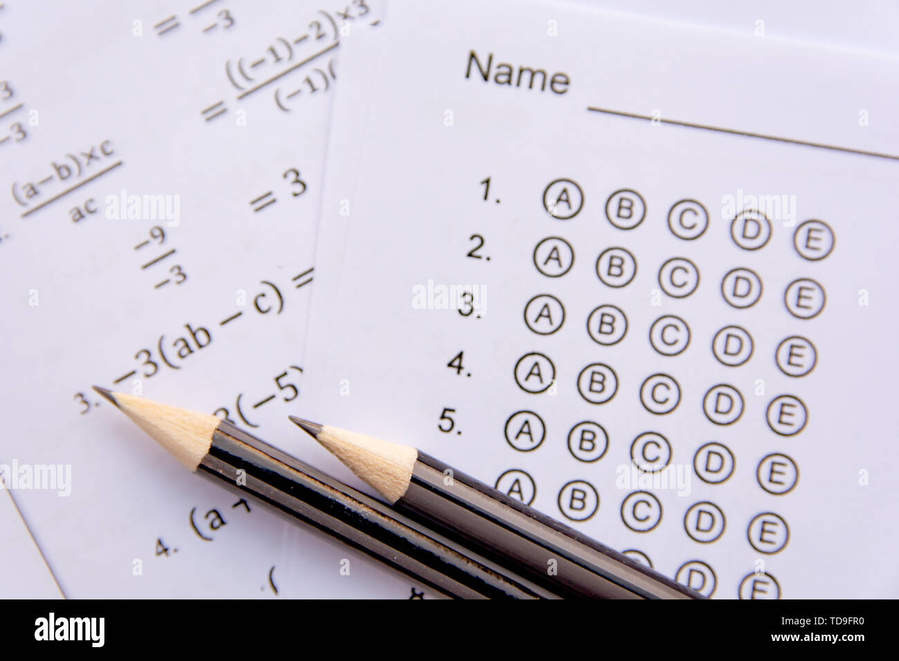 Pencil on answer sheets or Standardized test form with answers bubbled