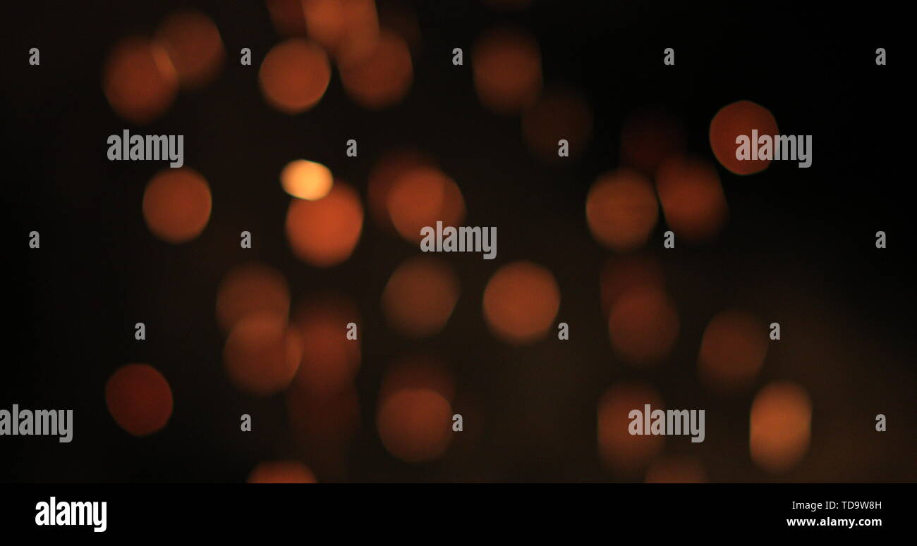bright and fiery bokeh on a black background Stock Photo - Alamy