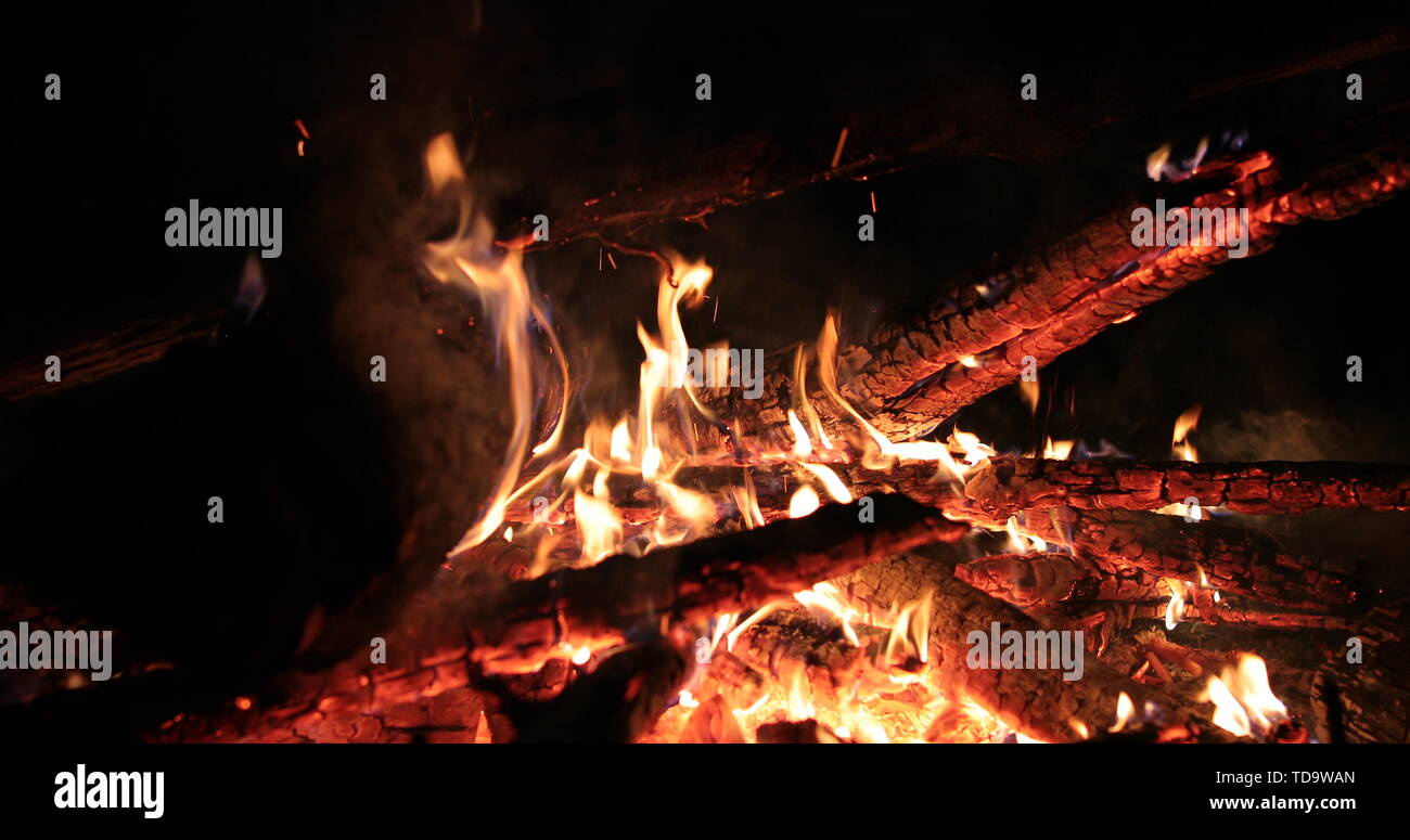 bright flaming of fire and hot wood at night Stock Photo - Alamy
