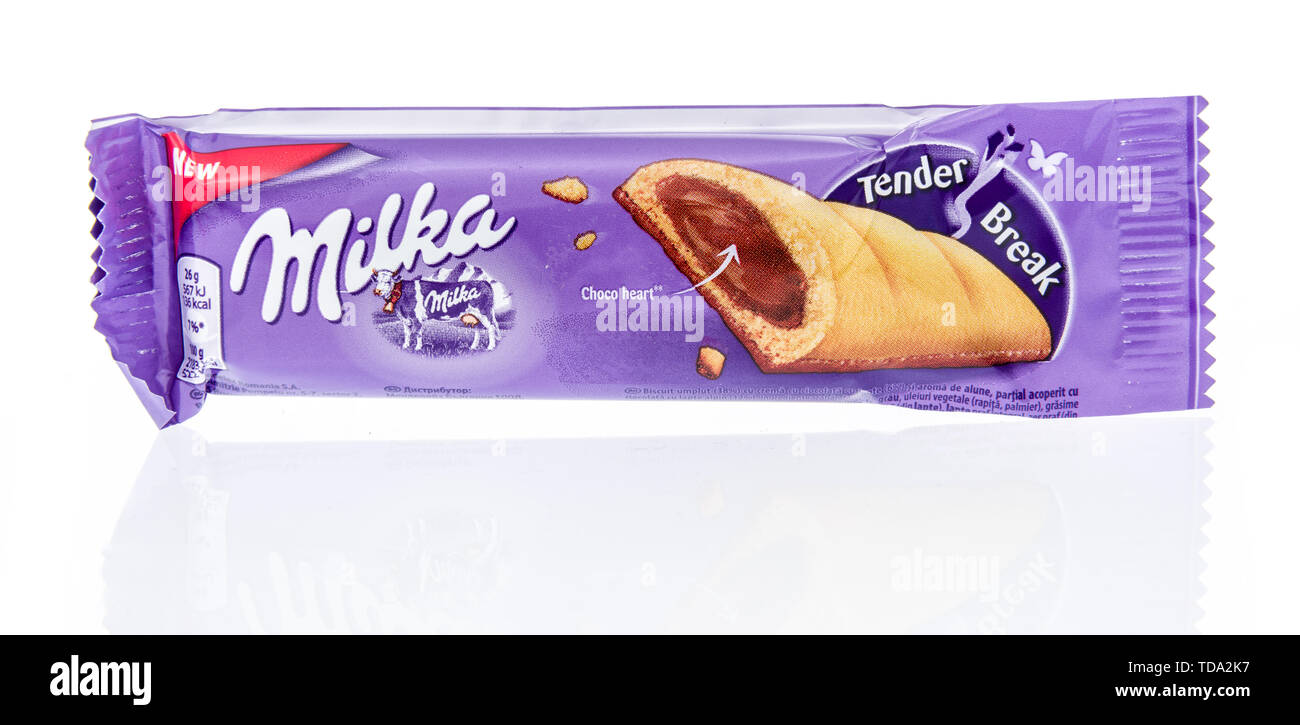 Winneconne, WI - 16 May 2019 : A package of Milka cookie bar tender break on an isolated background Stock Photo