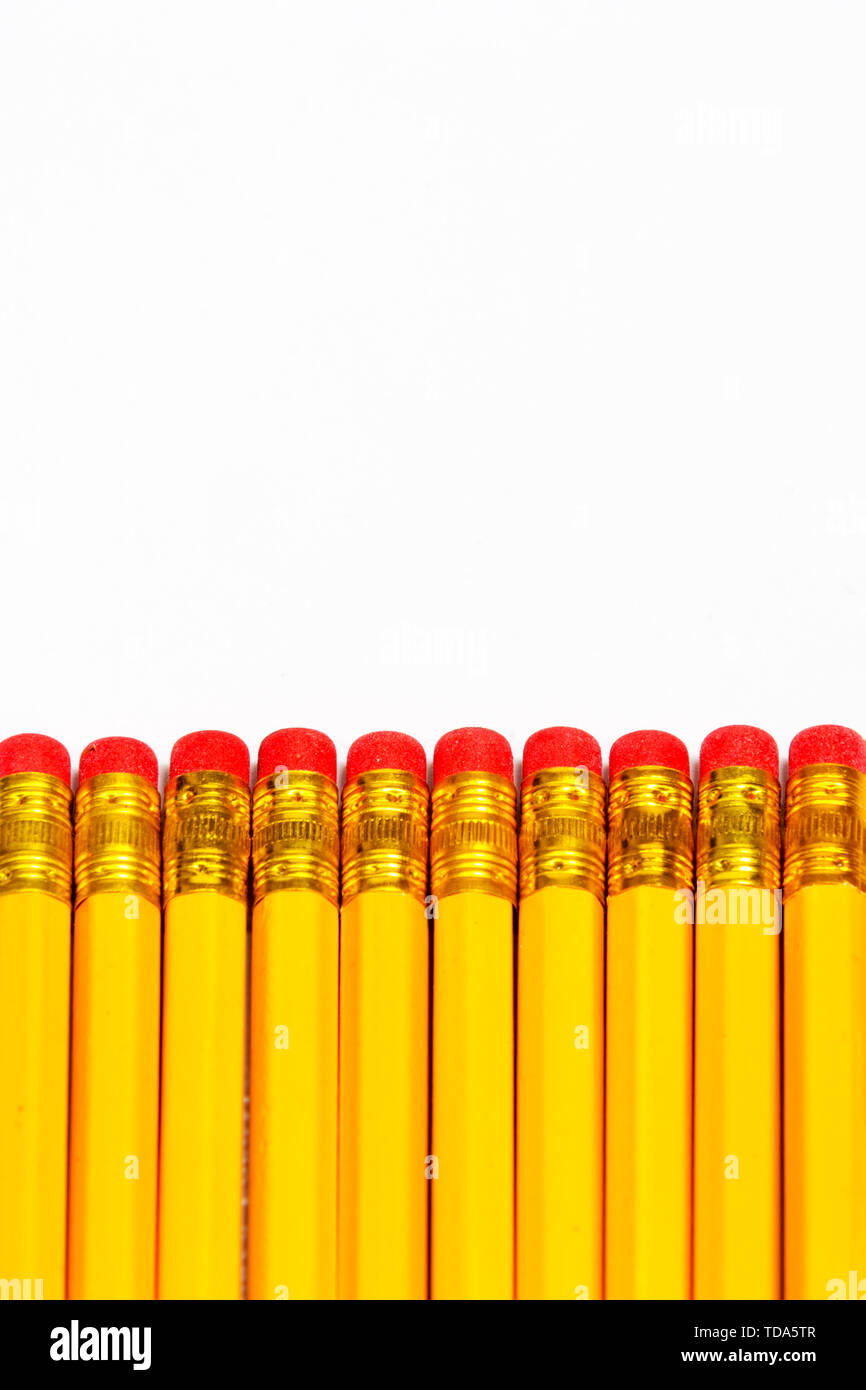 A neatly arranged yellow pencil. Stock Photo