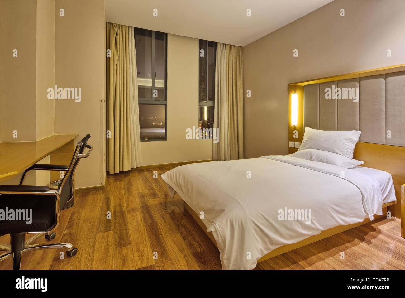 Single room table and chair Stock Photo - Alamy