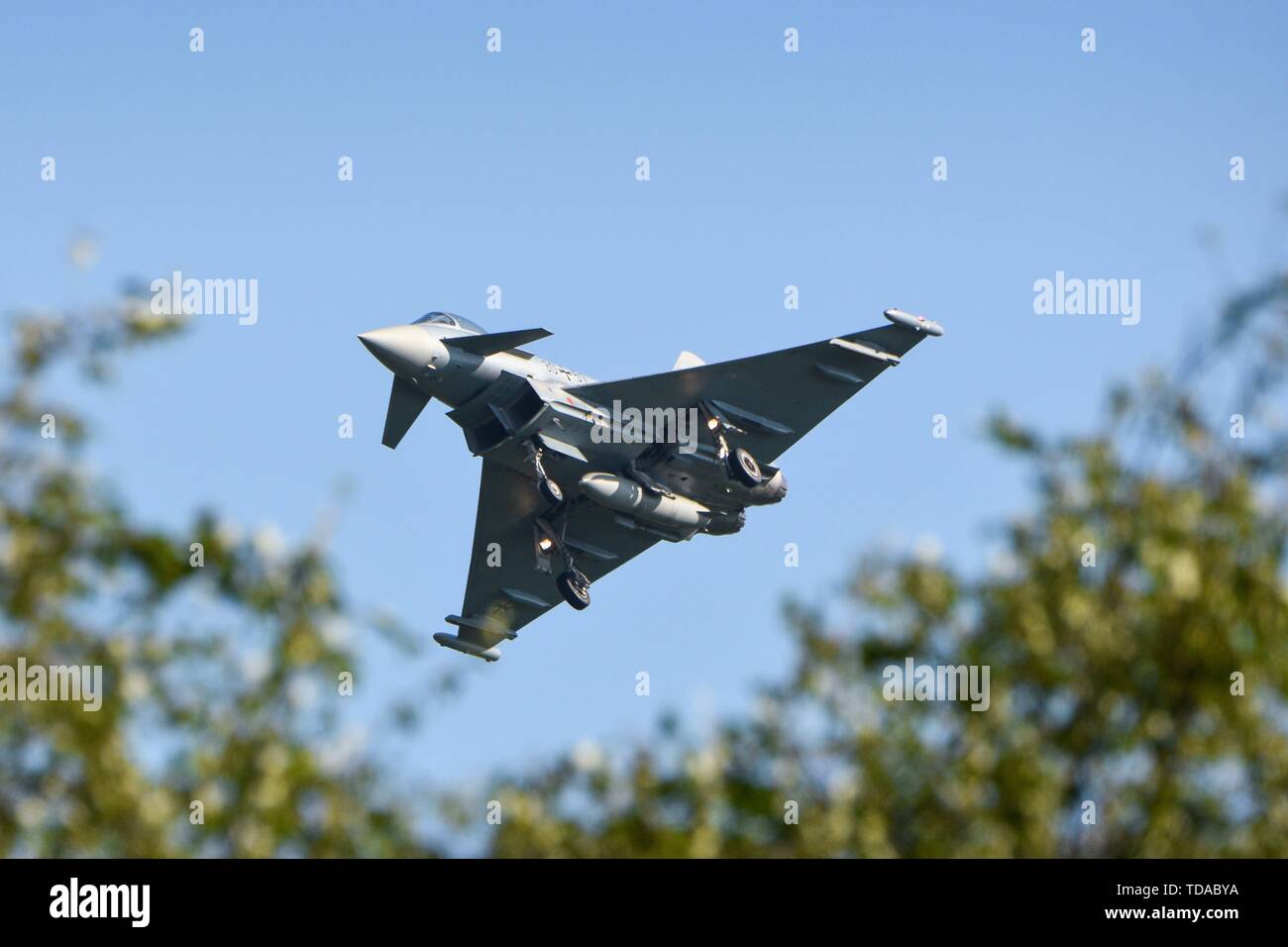 Jagel, Deutschland. 13th June, 2019. 13.06.2019, two days before the day of the Bundeswehr was on the airbase Schleswig of the Tactical Air Force Squadron 51 Immelmann, formerly Naval Air Squadron 1 (MFG 1) and Aufklarungsgeschwader 51 in Jagel, Schleswig-Holstein held a spotterday at the Planespotter, press representatives and interested parties Transport aircraft, fighter jets and helicopters from close up could photograph. A Eurofighter Typhoon in flight. | usage worldwide Credit: dpa/Alamy Live News Stock Photo