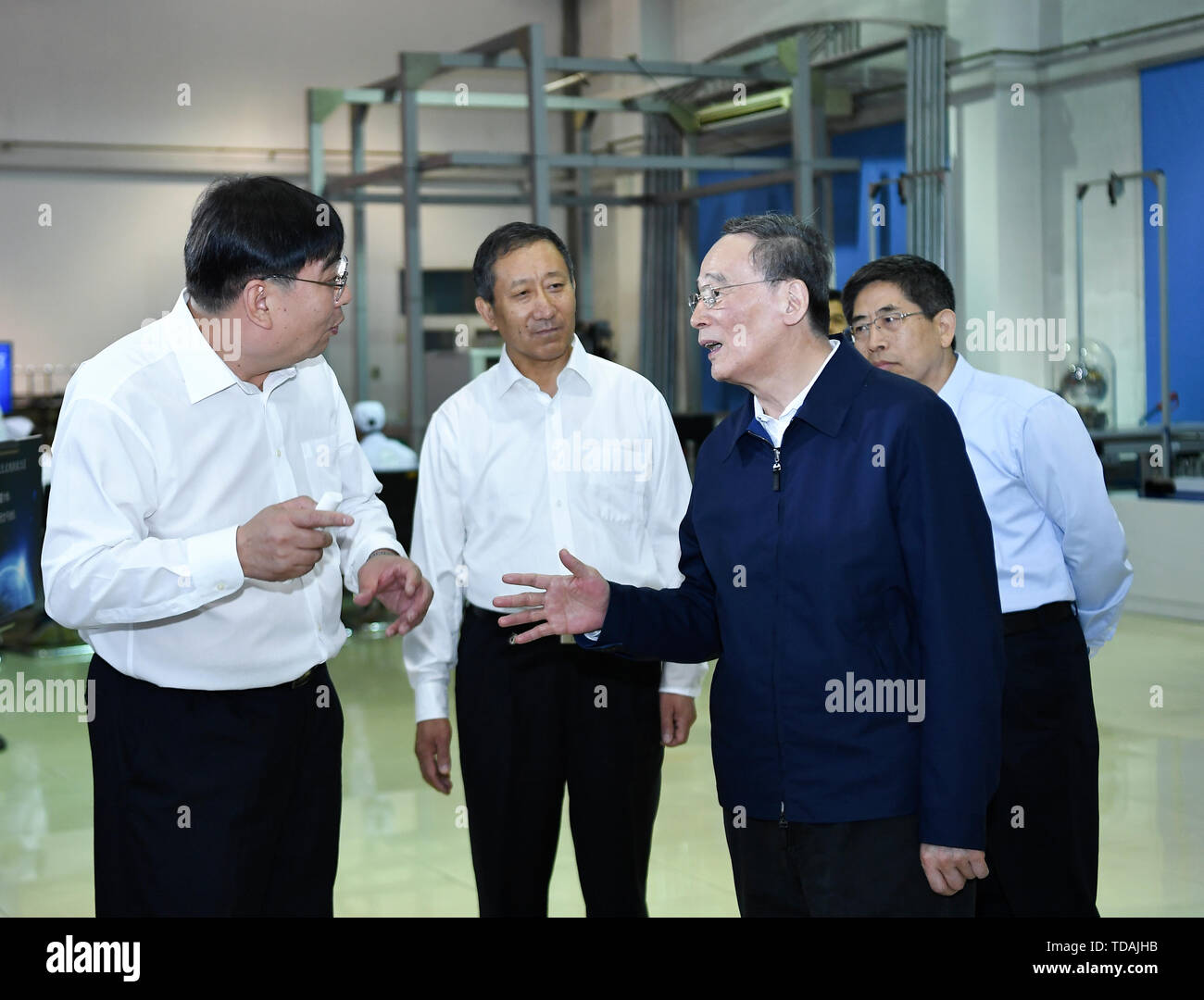 Harbin, China's Heilongjiang Province. 14th June, 2019. Chinese Vice President Wang Qishan visits the Harbin Institute of Technology in Harbin, northeast China's Heilongjiang Province, June 14, 2019. Wang paid an inspection tour in Heilongjiang from Thursday to Friday. Credit: Yan Yan/Xinhua/Alamy Live News Stock Photo
