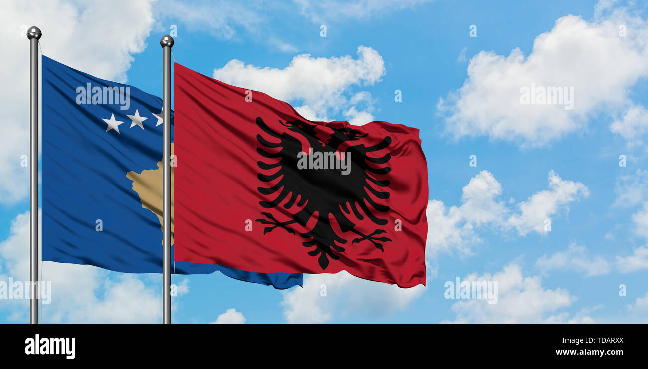 https://c8.alamy.com/comp/TDARXX/kosovo-and-albania-flag-waving-in-the-wind-against-white-cloudy-blue-sky-together-diplomacy-concept-international-relations-TDARXX.jpg