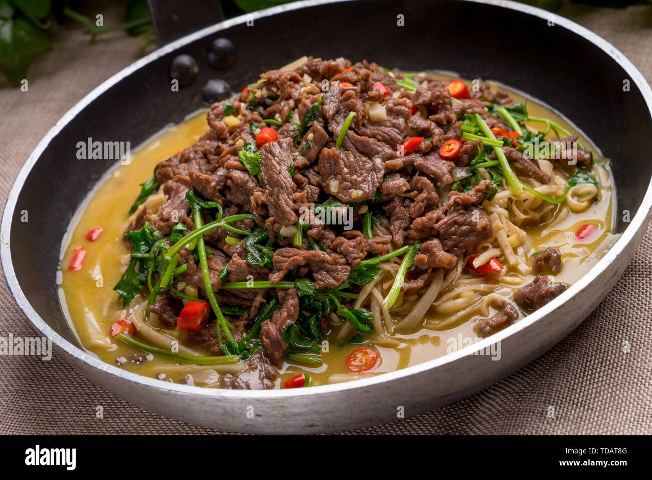Celery golden needle mushroom stirfried beef slices Stock Photo Alamy
