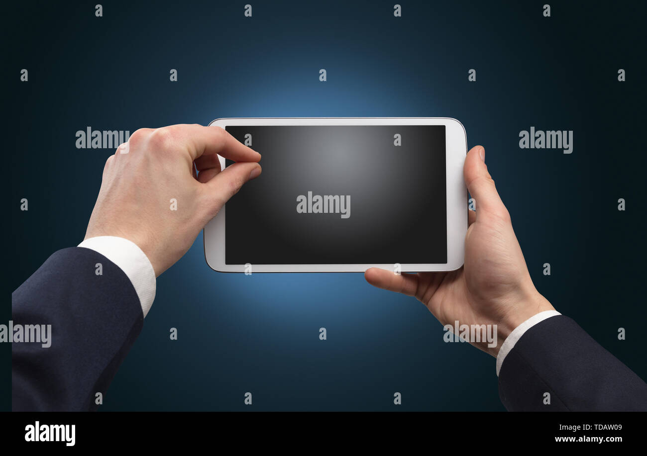 Hand using tablet with no concept and empty space Stock Photo - Alamy