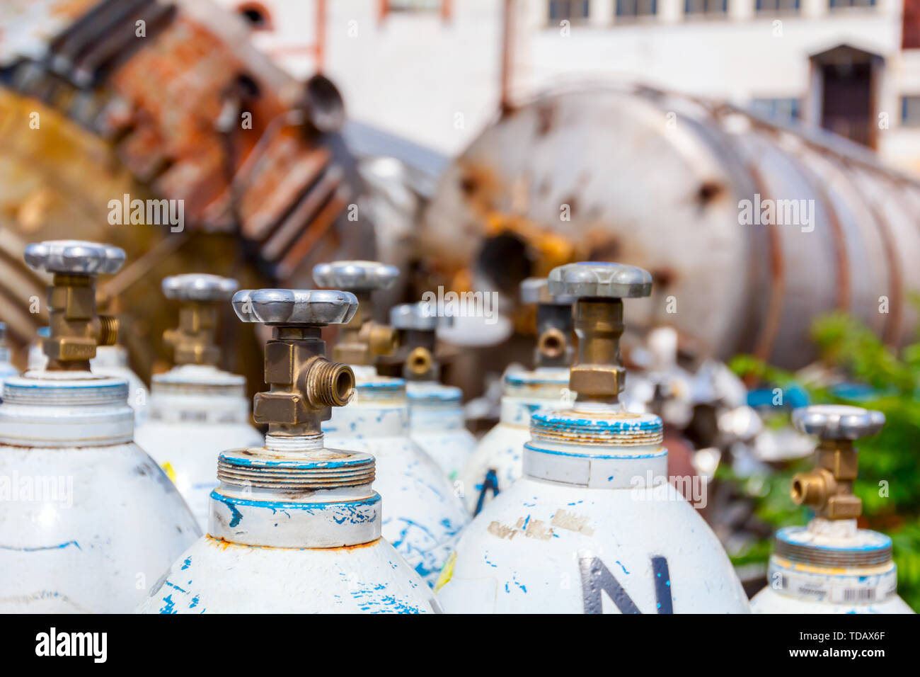 Used old gas welding tanks, for cutting scrap metal with torch at junkyard Stock Photo Alamy
