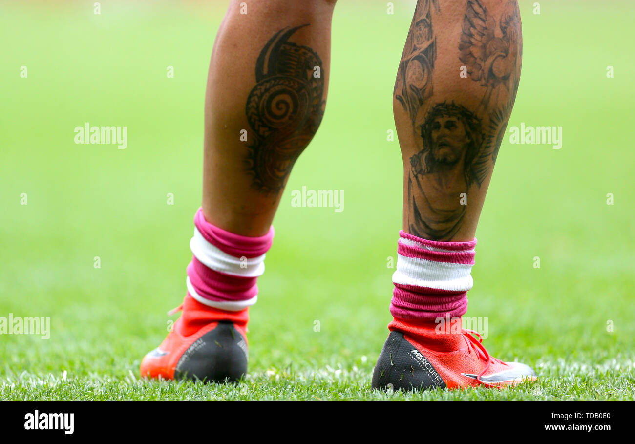 Detail of a jesus tattoo on the leg of Salford Red Devils' Ken Sio Stock Photo