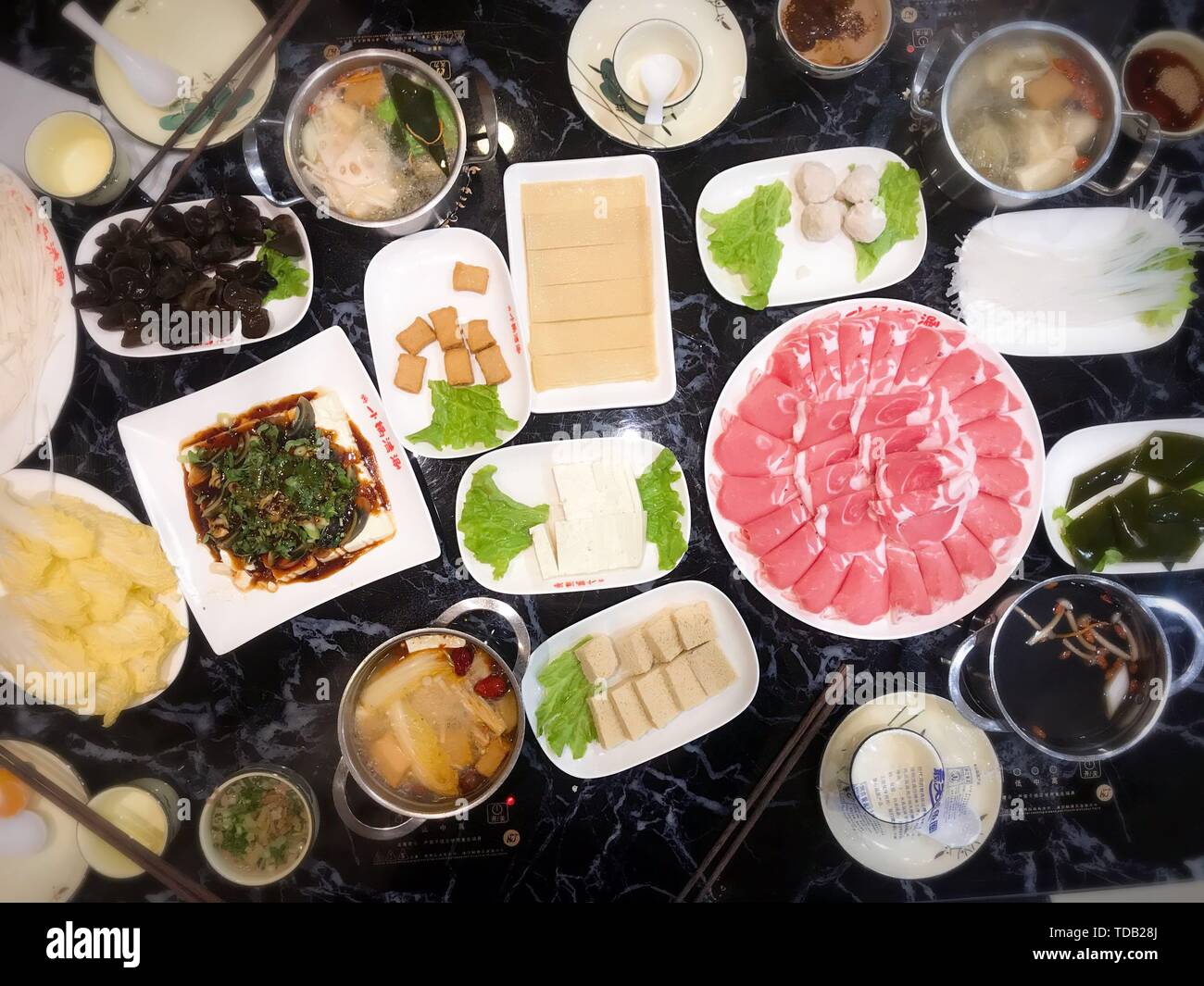 A table of side dishes, hot pot, favorite food Stock Photo Alamy