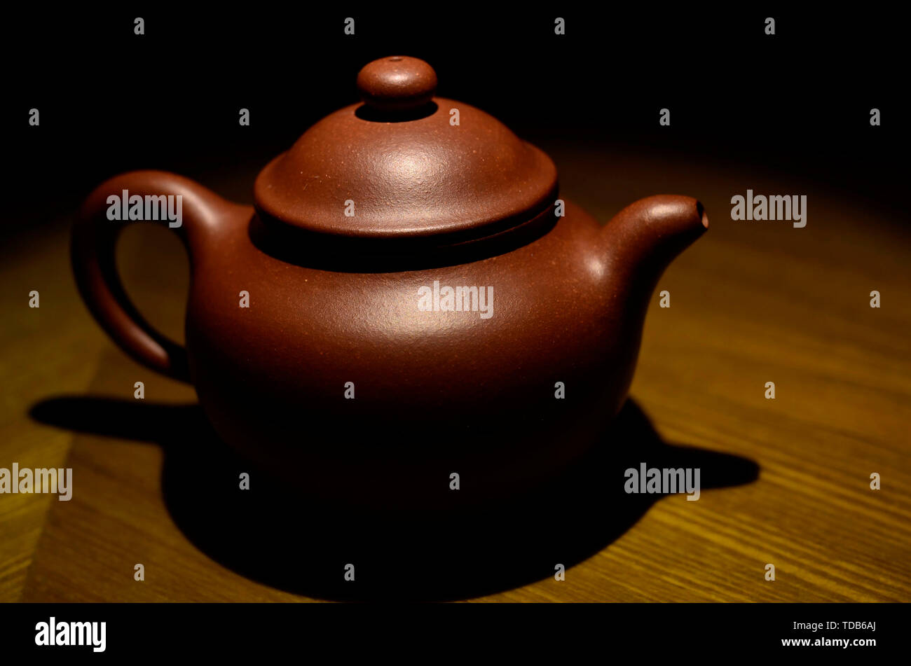 Purple sand pot under the light Stock Photo Alamy