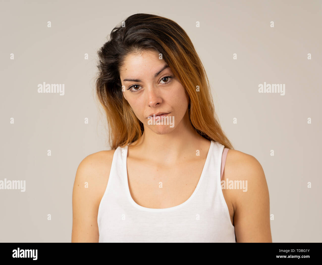 Facial expressions, emotions Anger. Young attractive caucasian woman with angry face. Looking