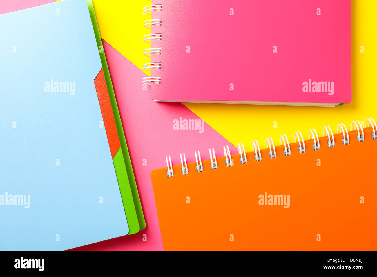 Composition with copybooks on two tone background, space for text Stock Photo
