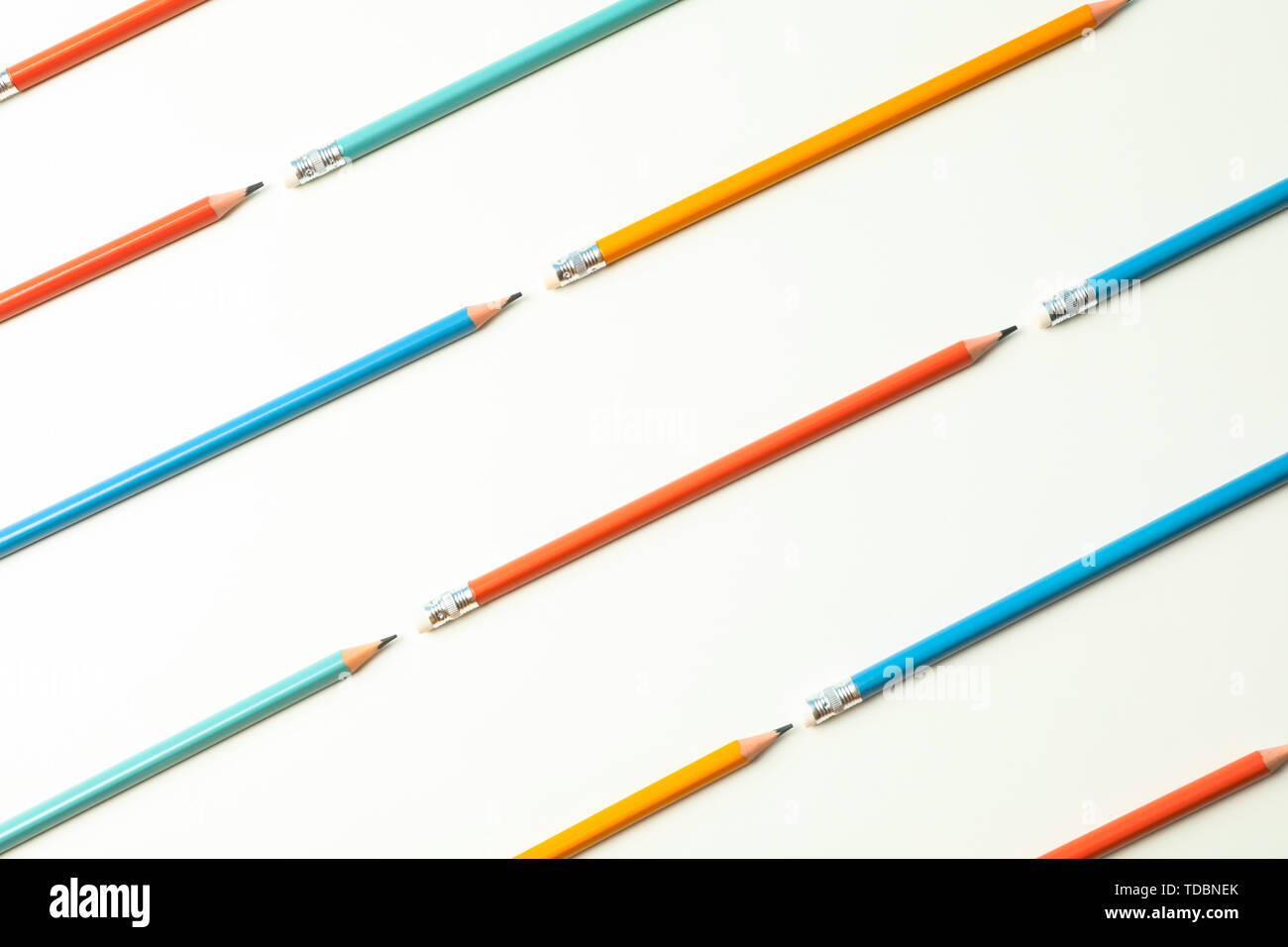 Flat lay composition with pencils on white background, space for text Stock Photo