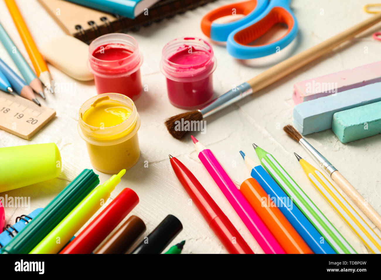 School supplies on white wooden background, closeup Stock Photo