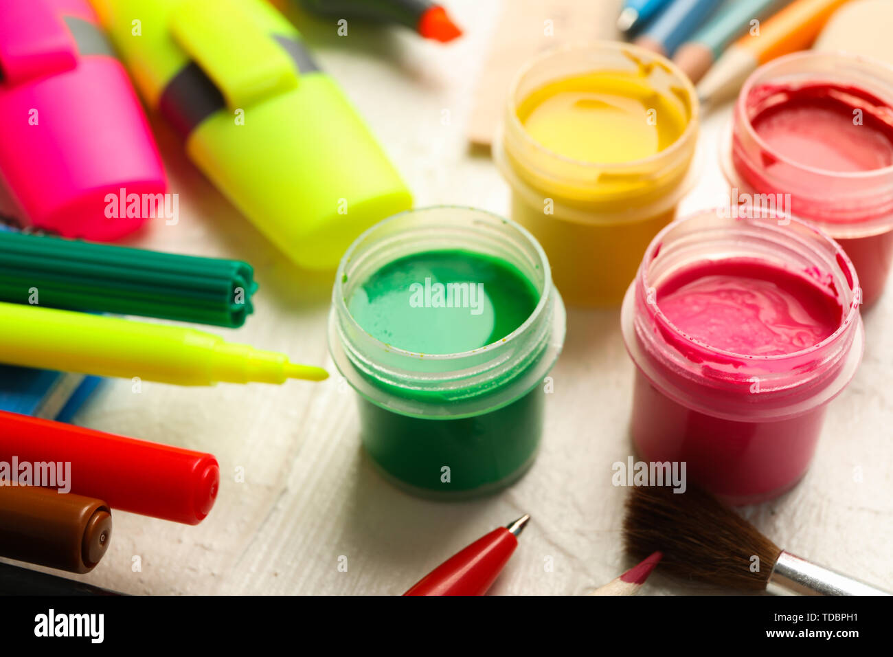 Drawing supplies on white wooden background, closeup Stock Photo