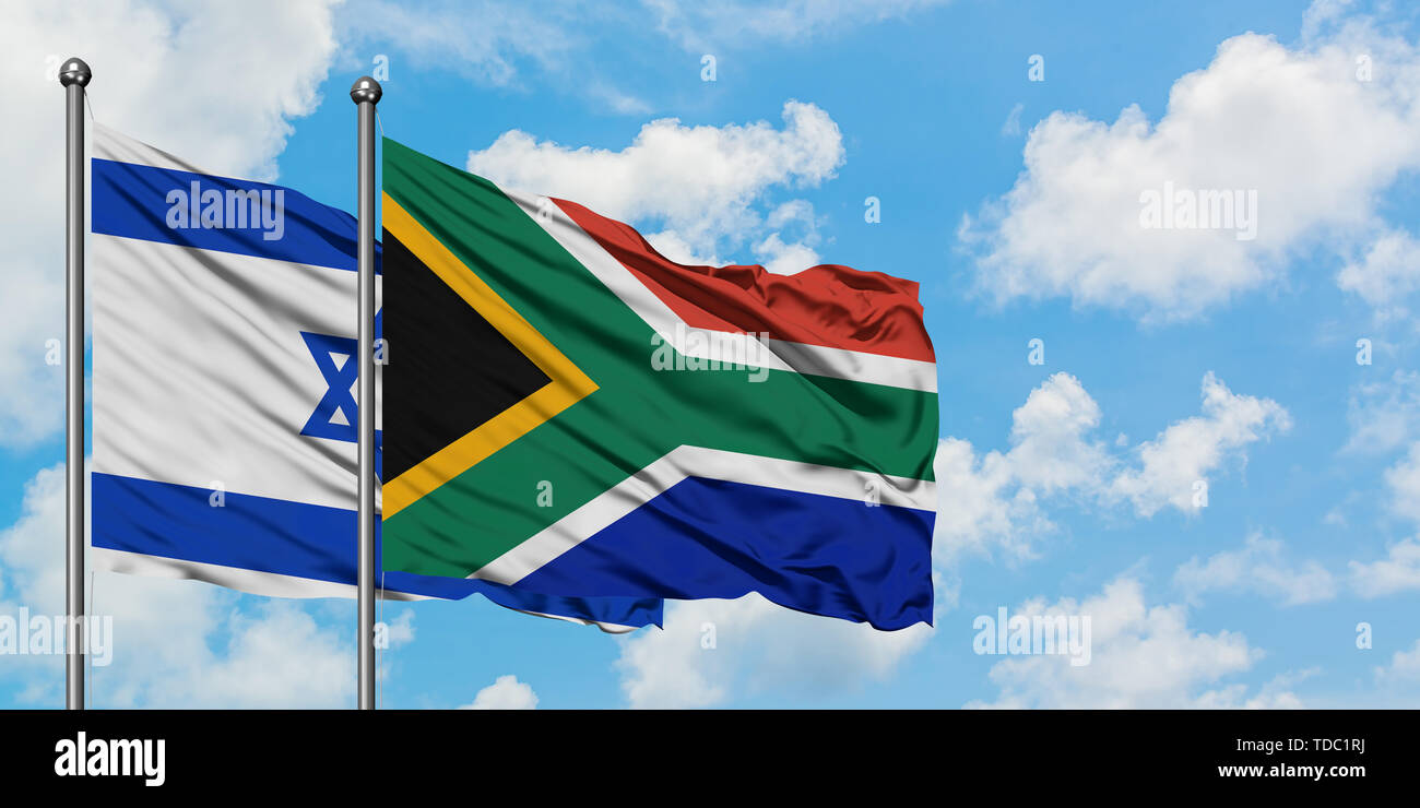 Israel and South Africa flag waving in the wind against white cloudy ...