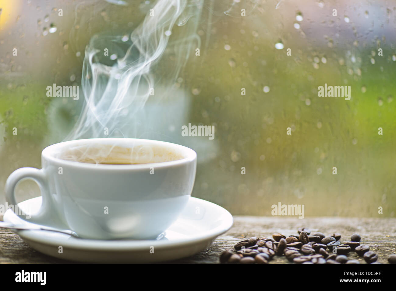 Wet Glass Window And Cup Of Hot Coffee Autumn Cloudy Weather Better With Caffeine Drink Enjoying Coffee On Rainy Day Coffee Morning Ritual Fresh Brewed Coffee White Mug And Beans On Windowsill