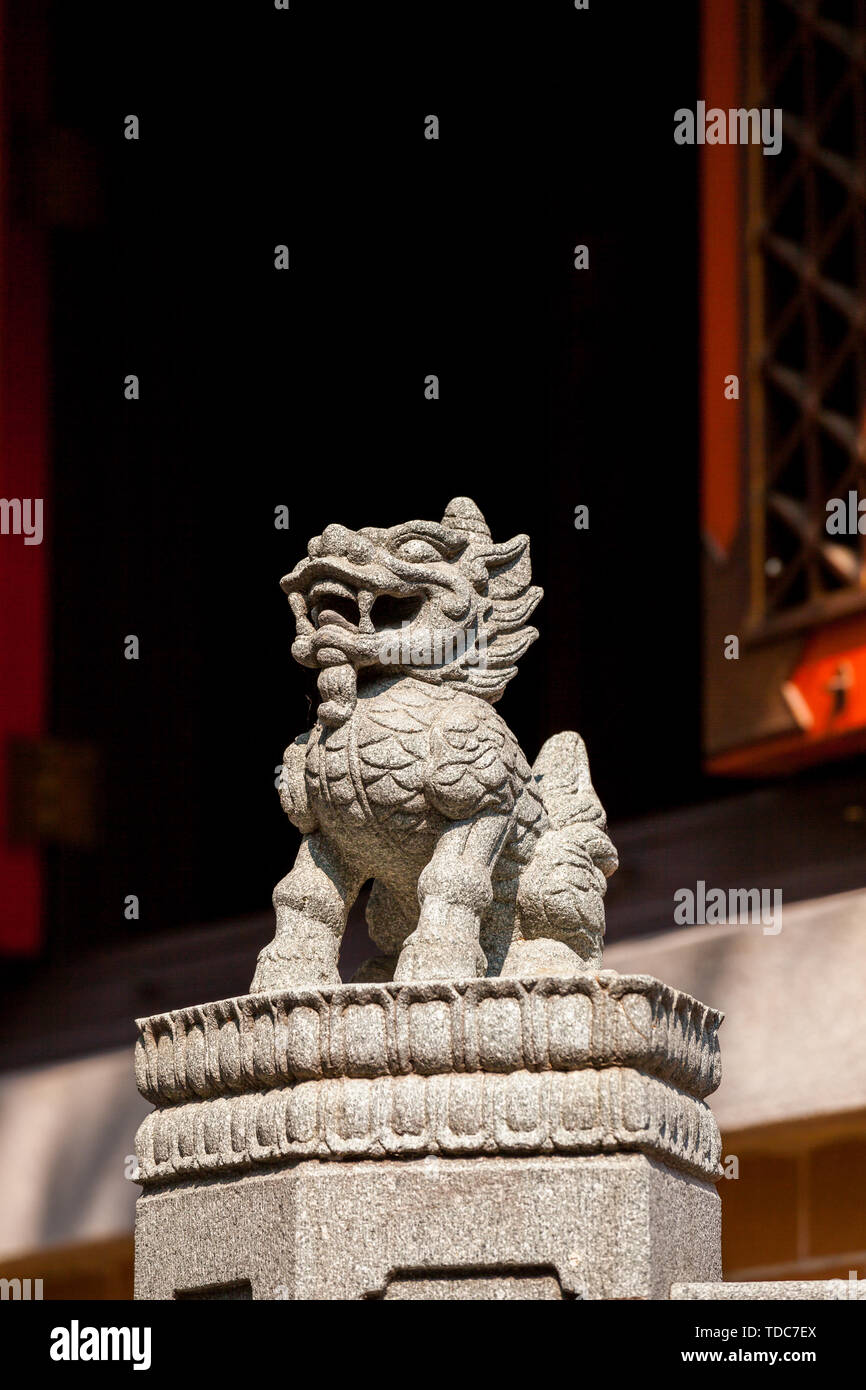 Small carved stone lion statue Stock Photo Alamy
