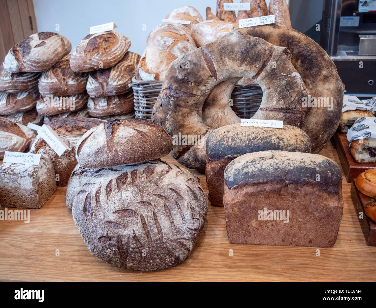 Artsian bread for sale at the Angel Bakery bakers shop Abergavenny Wales UK Stock Photo