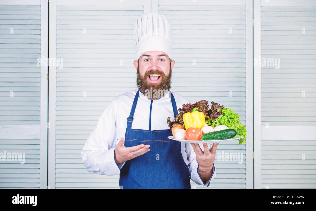 Handsome chef presenting meal hi-res stock photography and images - Alamy