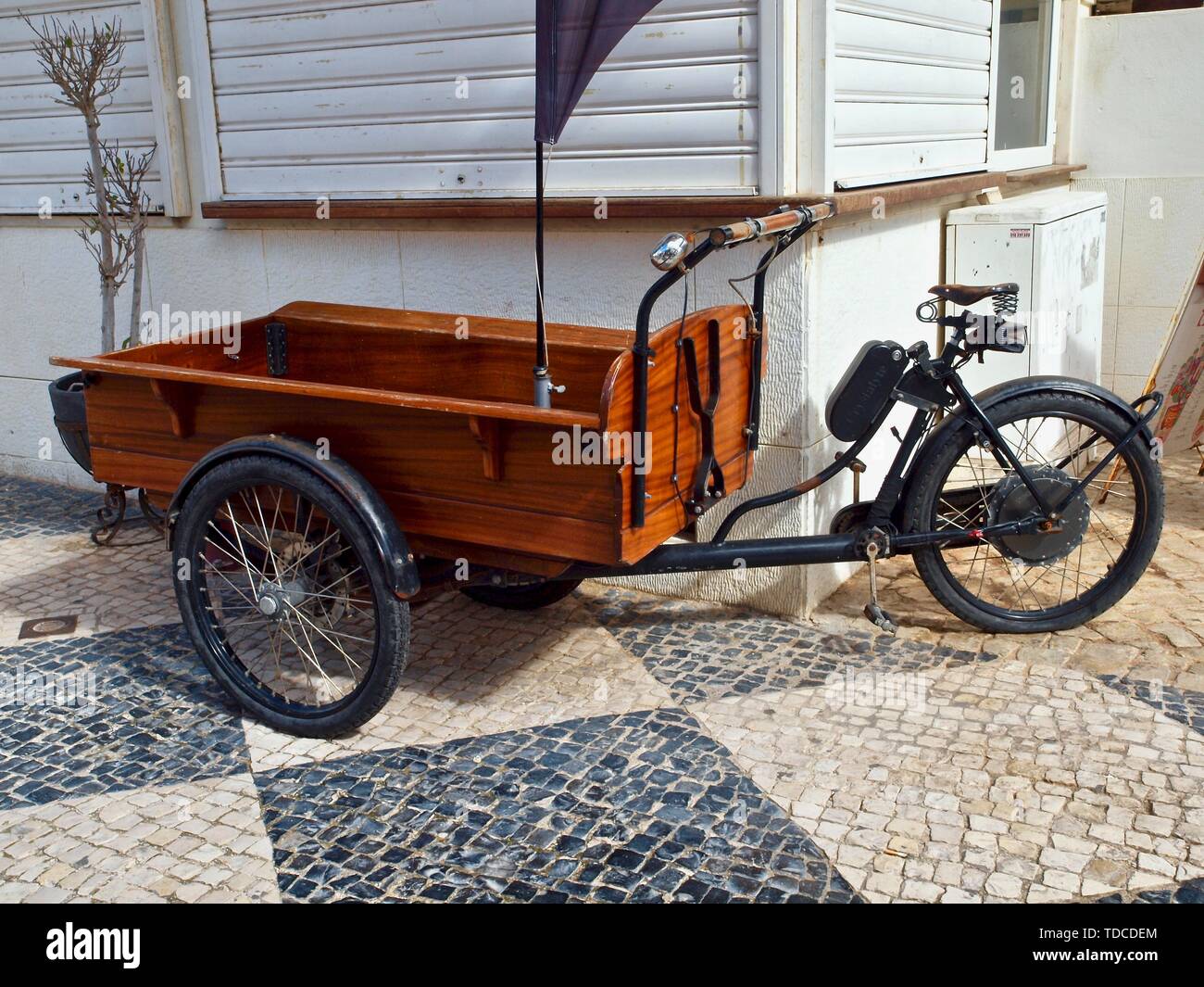 Bicycle with a wooden cart for transport Stock Photo Alamy