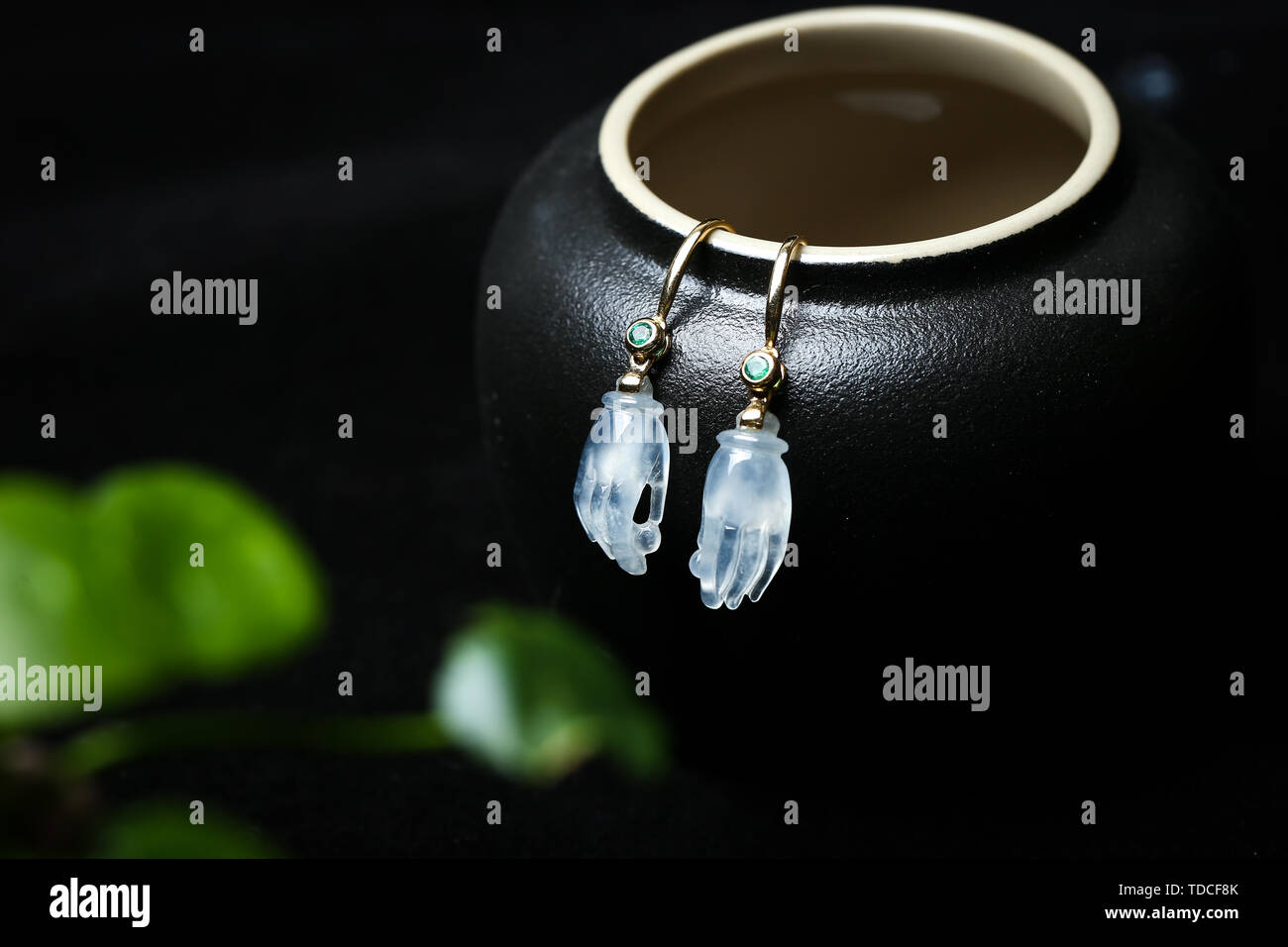 Jade stud earrings Stock Photo Alamy