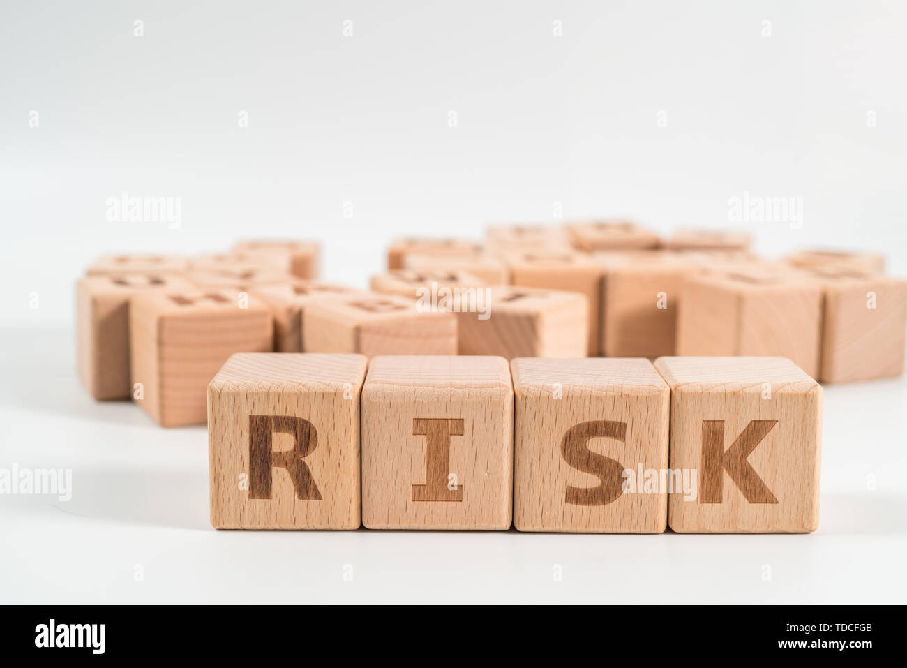 RISK wooden blocks of business concept isolated on white background ...