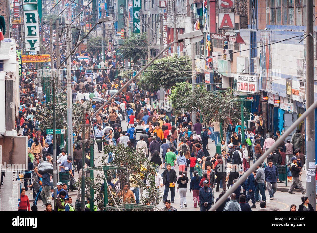 Lima / Peru Jun 13.2008: Crowd of people on the street of the biggest garment district called Gamarra. Stock Photo