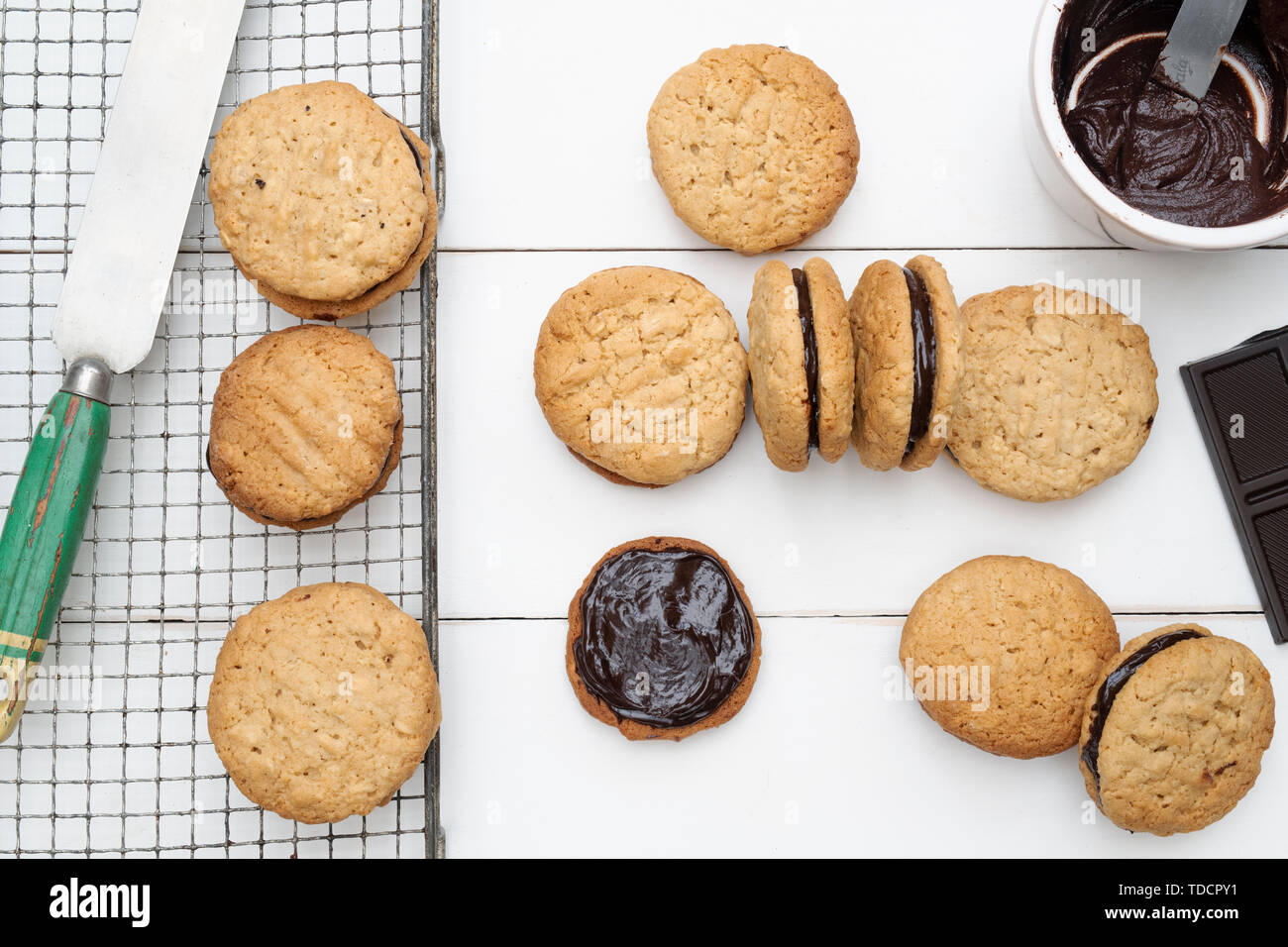 Homemade kingston biscuits. Australian biscuit. Round coconut and oat biscuits with chocolate cream in the middle Stock Photo