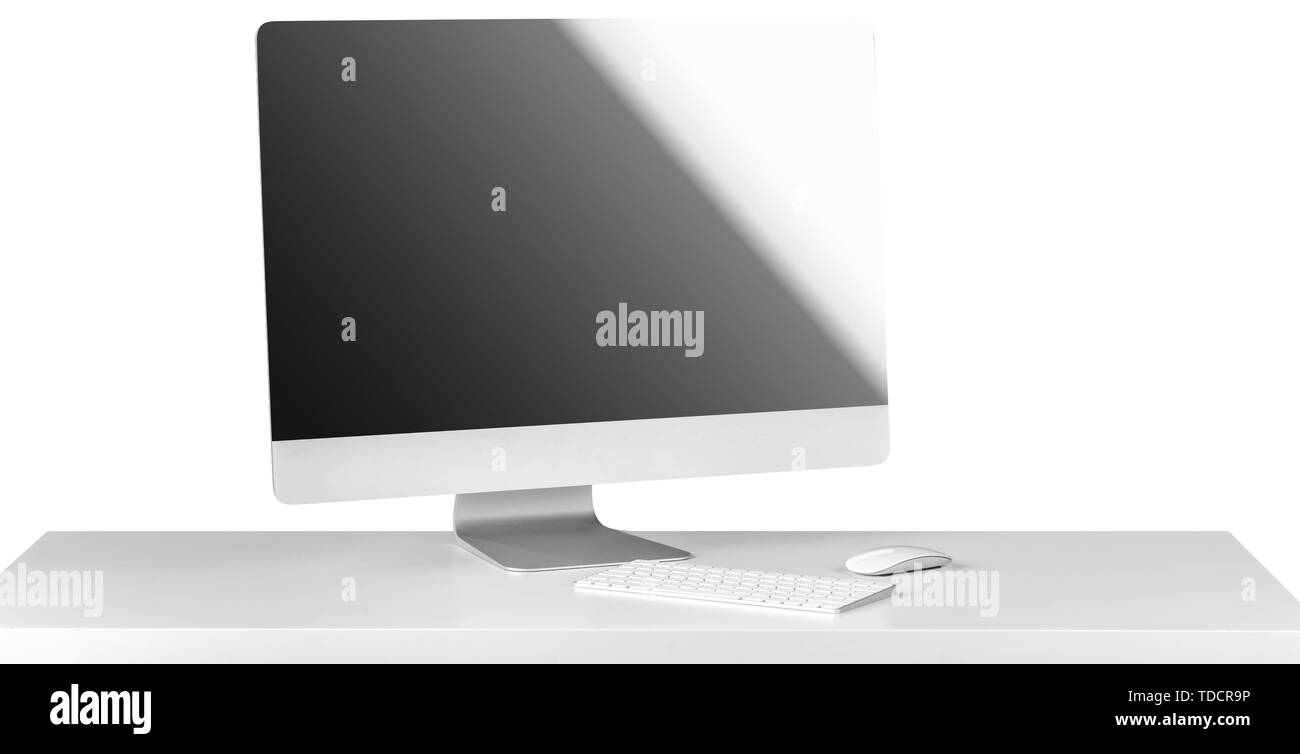Computer monitor black screen with keyboard on white table. Education or business concept Stock
