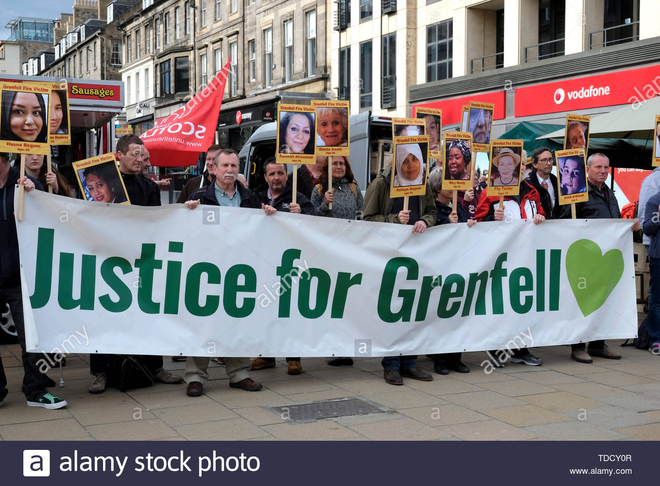 Edinburgh, Scotland, UK. 14th June 2019.  Silent Vigil for the Grenfell Fire disaster, in Castle Street Edinburgh. On the second anniversary of the Grenfell fire, campaigners hold a silent vigil.  Credit: Craig Brown Stock Photo