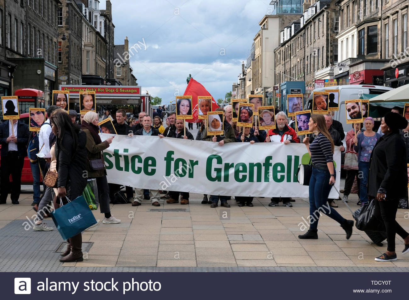 Edinburgh, Scotland, UK. 14th June 2019.  Silent Vigil for the Grenfell Fire disaster, in Castle Street Edinburgh. On the second anniversary of the Grenfell fire, campaigners hold a silent vigil.  Credit: Craig Brown Stock Photo