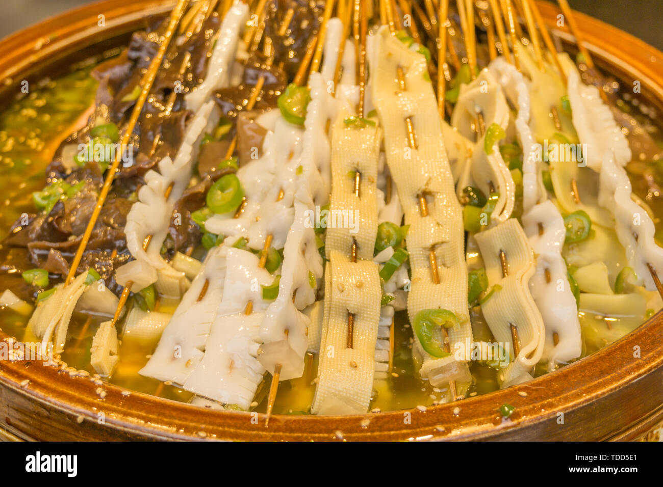Snack spicy string string in Chengdu, Sichuan, China Stock Photo - Alamy
