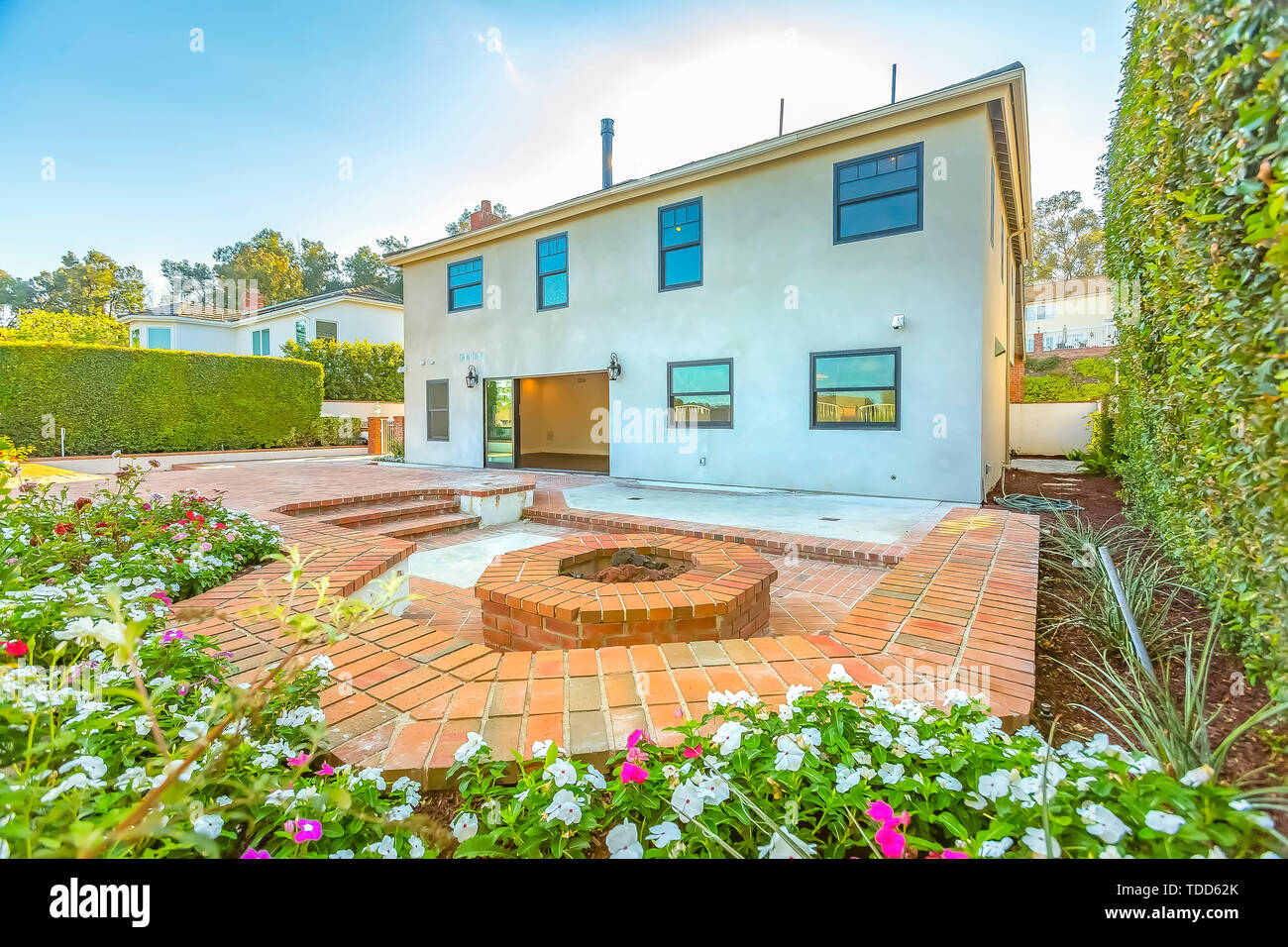 House With A Stone Brick Patio And Octagonal Fire Pit Made Of The