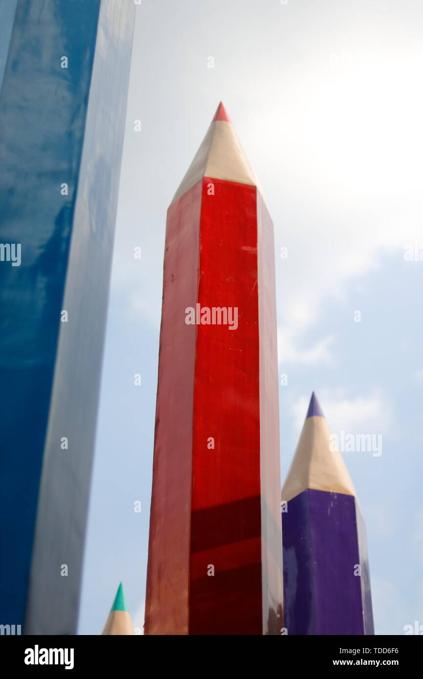 Blue sky pencil crayon building Stock Photo Alamy