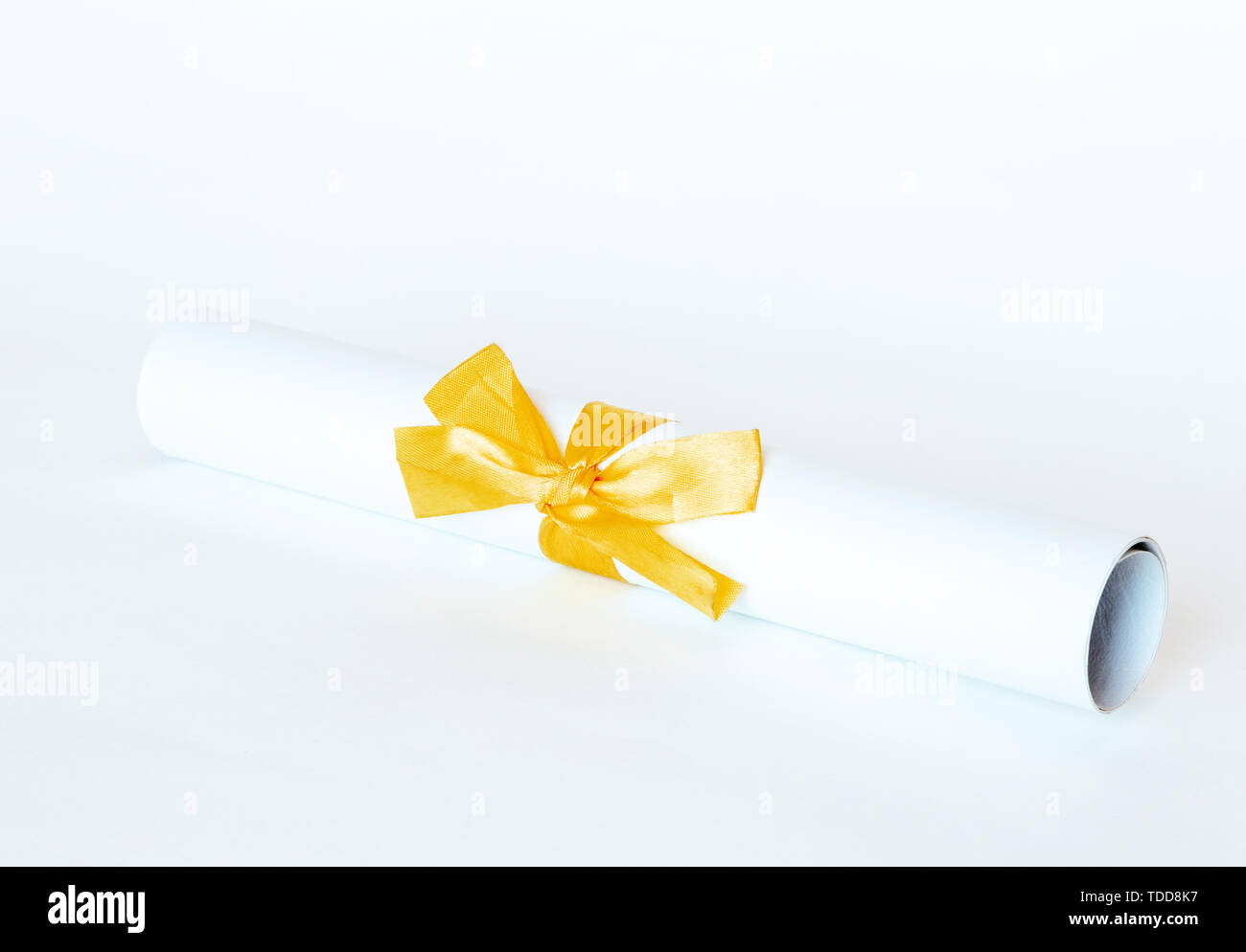 Certificate diploma with golden ribbon isolated on white background