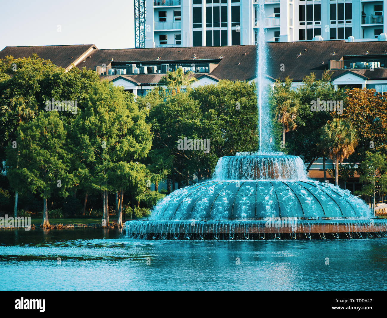 The view of the fountain in the middle of the lake in downtown, Orlando