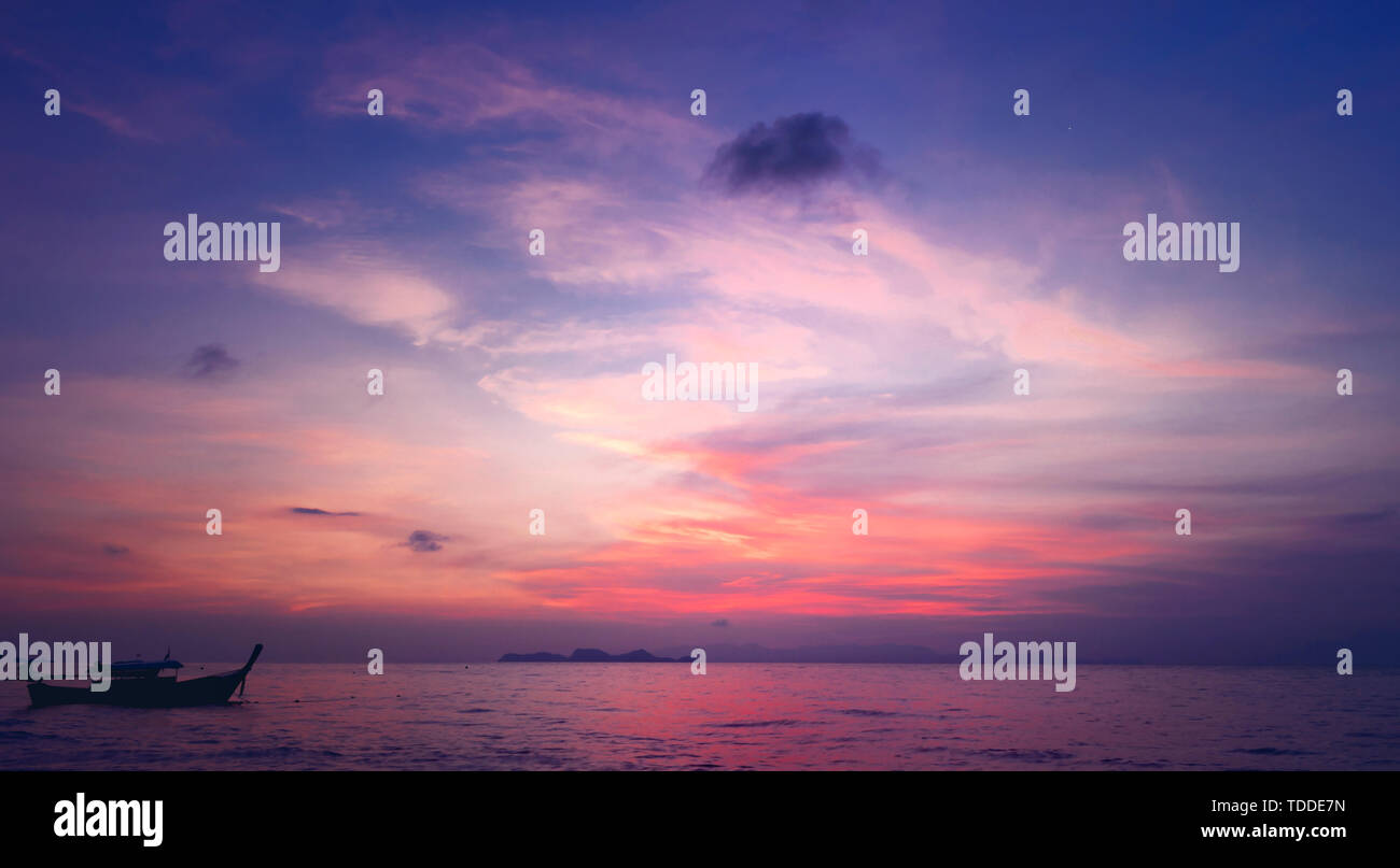 Sunrise by the sea Stock Photo - Alamy