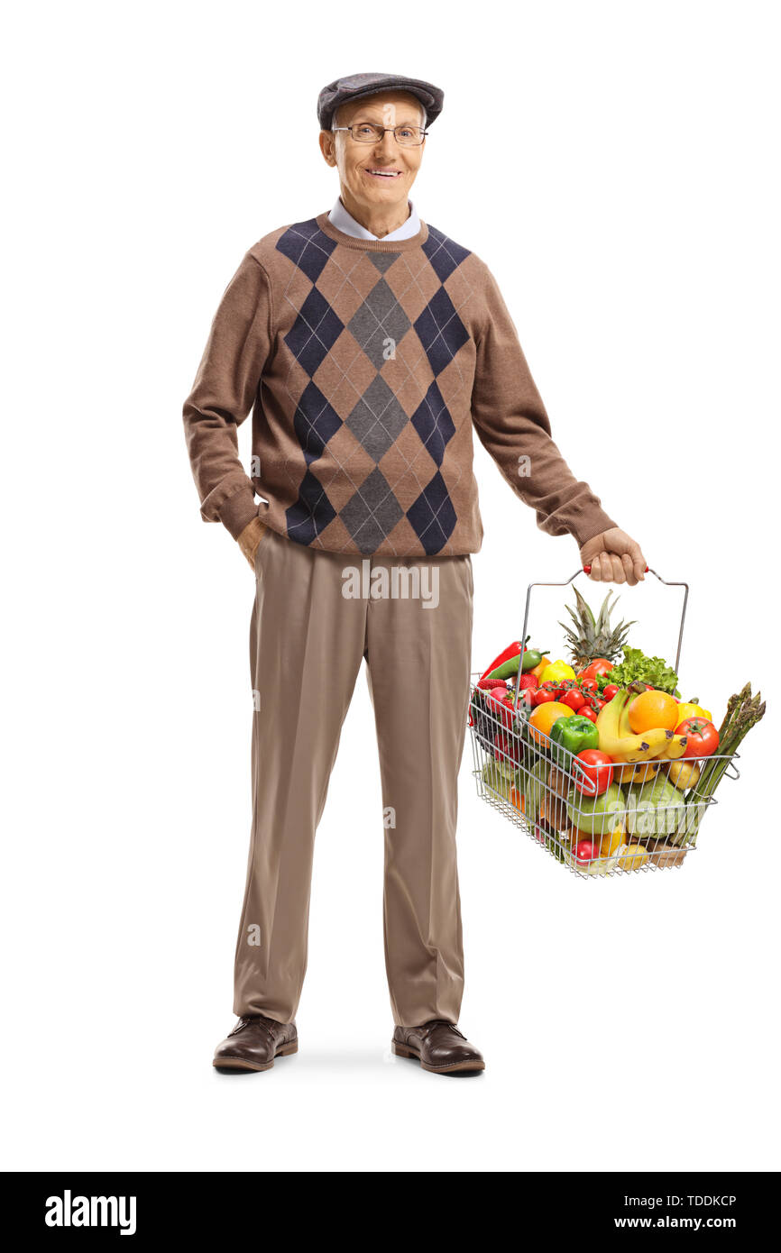 Full length portrait of an elderly man carrying a shopping basket with ...