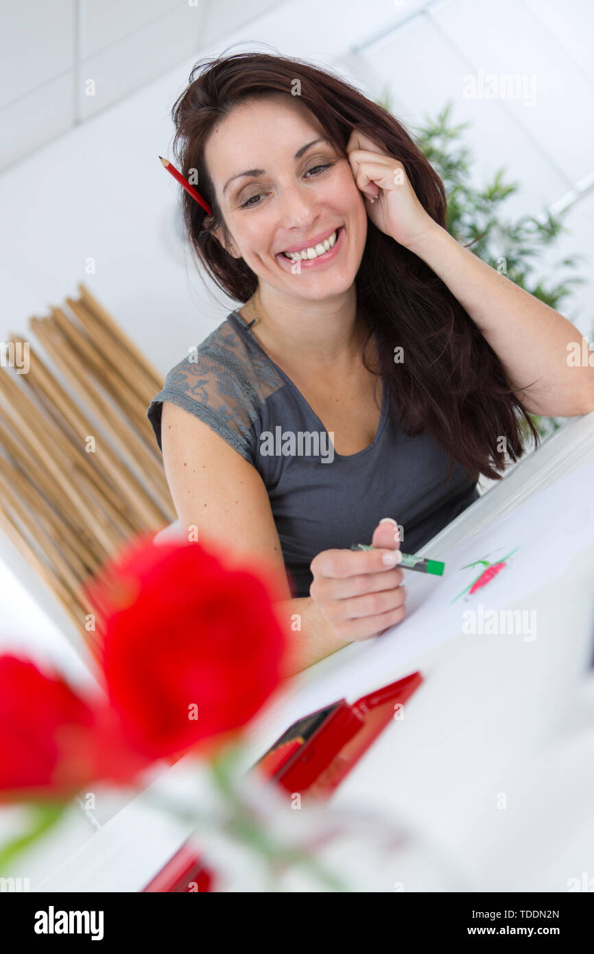 relaxed woman with adult coloring book Stock Photo