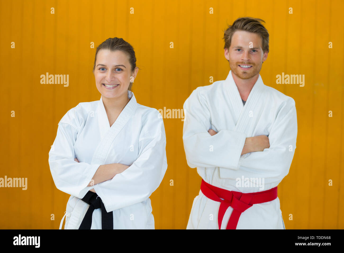 karate couple looking at camera Stock Photo - Alamy