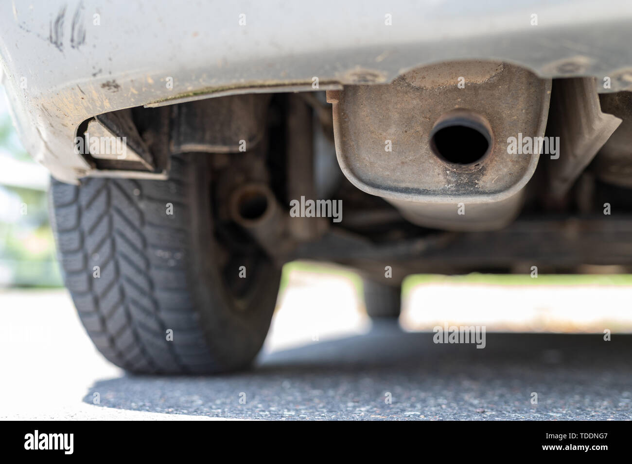 Exhaust pipe and car silencer. The car's exhaust system. Place car