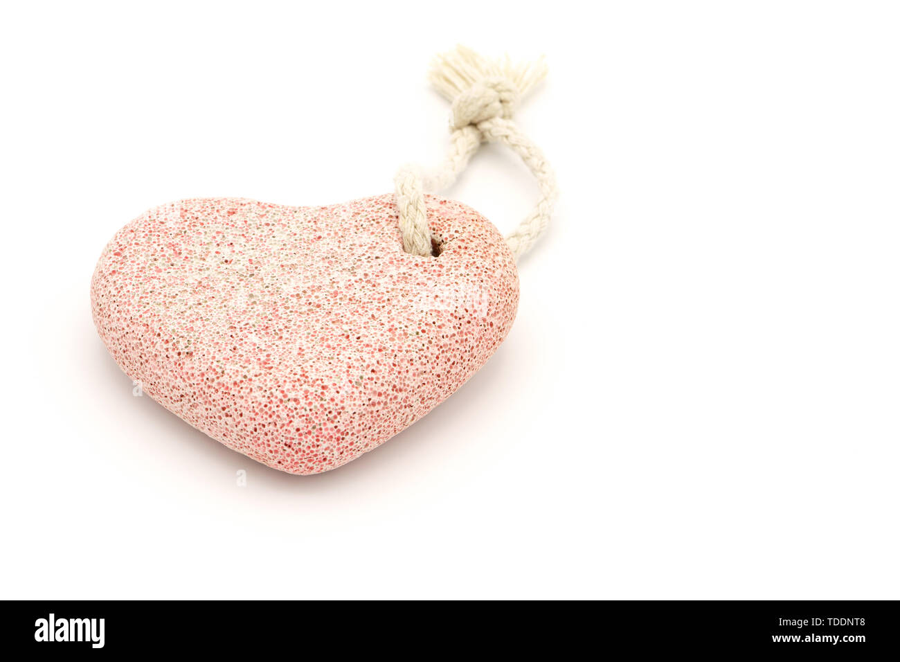 Natural pumice stone on white background. Feet care concept, pedicure