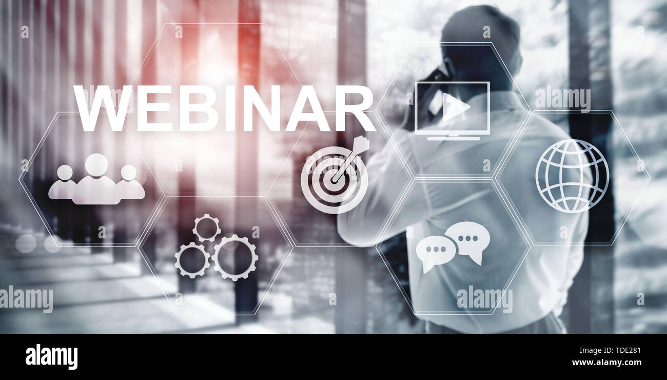 Inscription on virtual screen: Webinar. Abstract business background. Stock Photo