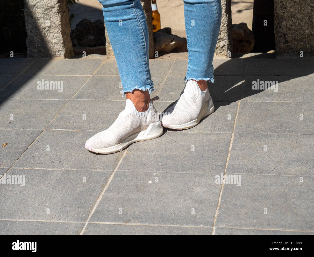 white shoes with light blue jeans