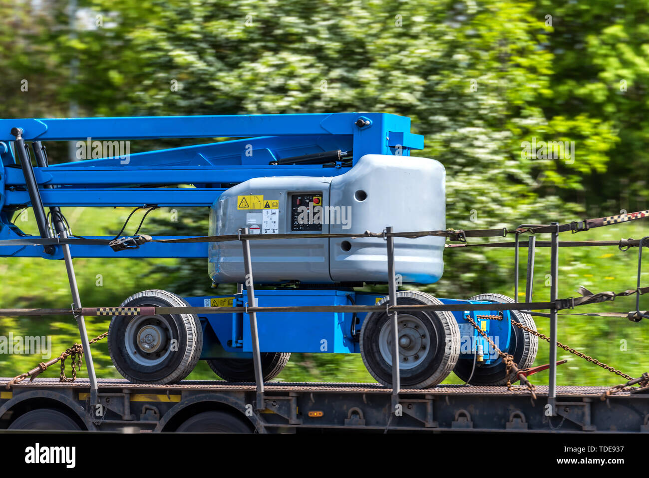 telescopic elevator lifting equipment in transporting progress on uk